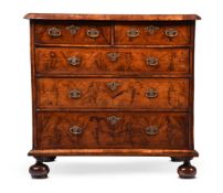A WILLIAM & MARY FIGURED WALNUT AND FEATHER BANDED CHEST OF DRAWERS, CIRCA 1690