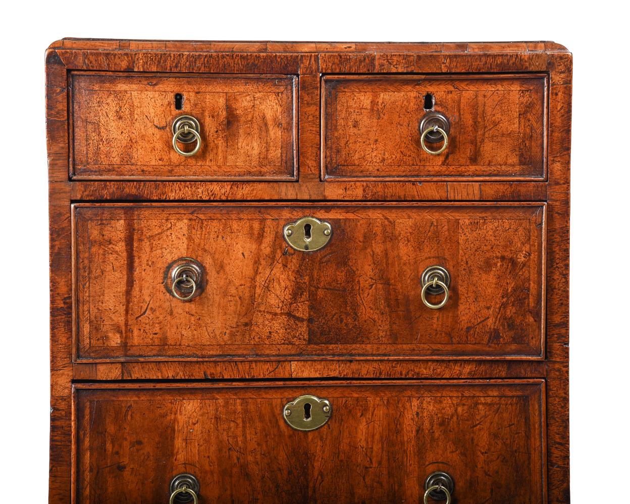 A GEORGE II WALNUT AND FEATHER BANDED MINIATURE CHEST OF DRAWERS, CIRCA 1735 - Image 3 of 3