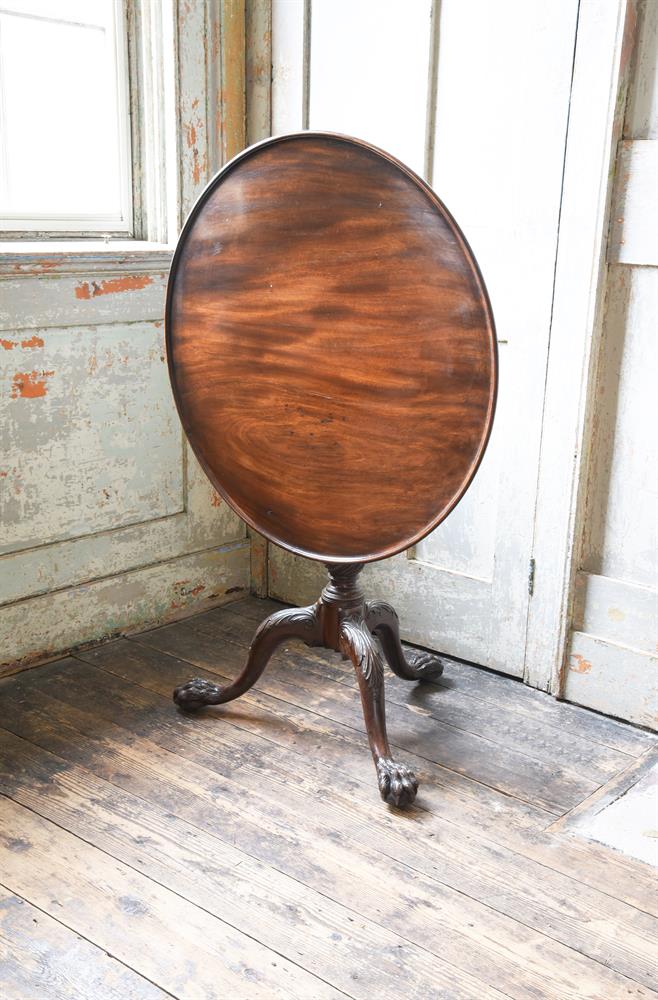 A GEORGE II CARVED MAHOGANY TRIPOD TABLE, CIRCA 1750