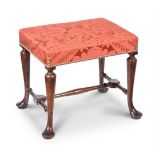 A GEORGE II WALNUT AND UPHOLSTERED STOOL, CIRCA 1730