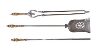 A SET OF THREE REGENCY POLISHED STEEL AND BRASS HANDLED FIRE TOOLS, EARLY 19TH CENTURY