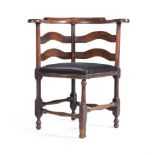 A GEORGE II WALNUT CORNER ARMCHAIR, MID 18TH CENTURY