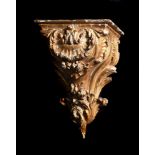 AN EARLY GEORGE III CARVED GILTWOOD WALL BRACKET, CIRCA 1760