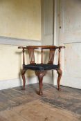 AN IRISH GEORGE II MAHOGANY CORNER ARMCHAIR, CIRCA 1755