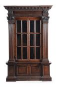 A GEORGE II OAK ARCHITECTURAL BOOKCASE OR CABINET, IN NEO PALLADIAN STYLE, CIRCA 1740