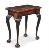 A GEORGE II MAHOGANY FOLDING TEA TABLE, CIRCA 1750