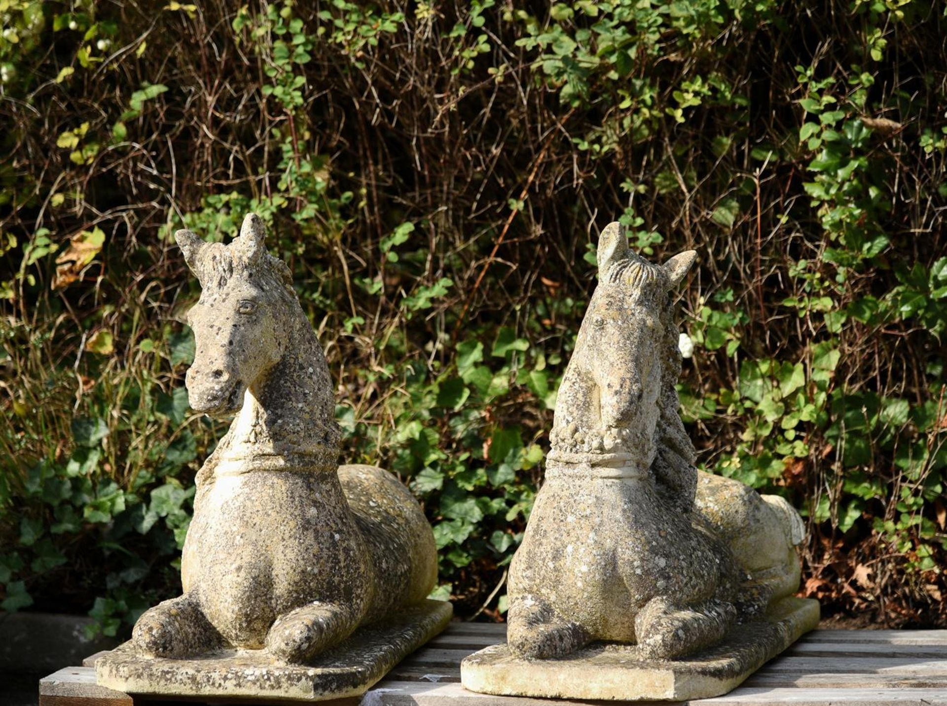 A PAIR OF COMPOSITION STONE RECUMBENT HORSES, 20TH CENTURY - Image 3 of 3