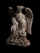 A LARGE CARVED AND PAINTED FIGURE OF AN EAGLE, IN THE MANNER OF WILLIAM KENT