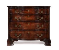 A GEORGE III MAHOGANY AND CROSSBANDED SERPENTINE FRONT COMMODE, IN THE MANNER OF THOMAS CHIPPENDALE