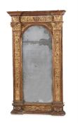 AN ITALIAN CARVED GILTWOOD MIRROR, OF TABERNACLE TYPE, 17TH/18th CENTURY