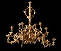 A GILTWOOD SIXTEEN-LIGHT CHANDELIER, PROBABLY ITALIAN, FIRST HALF 20TH CENTURY
