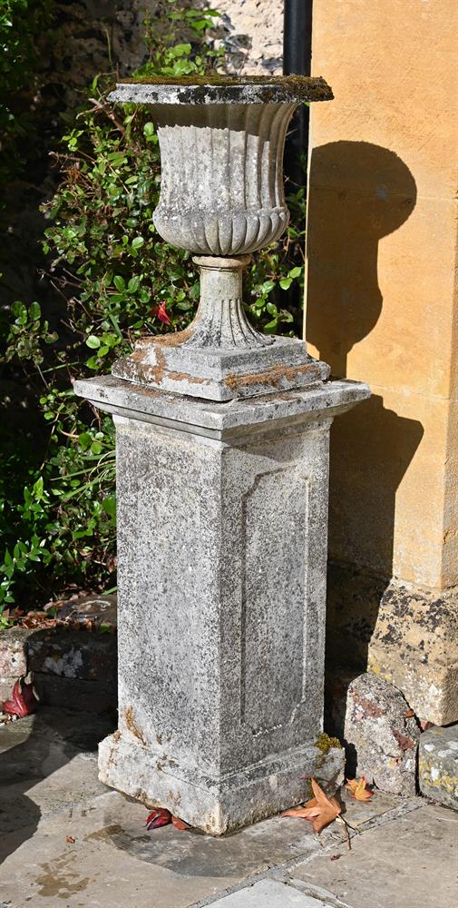 A PAIR OF COMPOSITION STONE CAMPANA URNS ON PLINTHS, LATE 19TH/EARLY 20TH CENTURY - Image 2 of 3