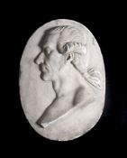 A CARVED WHITE MARBLE PROFILE RELIEF PLAQUE OF A GENTLEMAN, MANNER OF JOHN FLAXMAN, CIRCA 1790