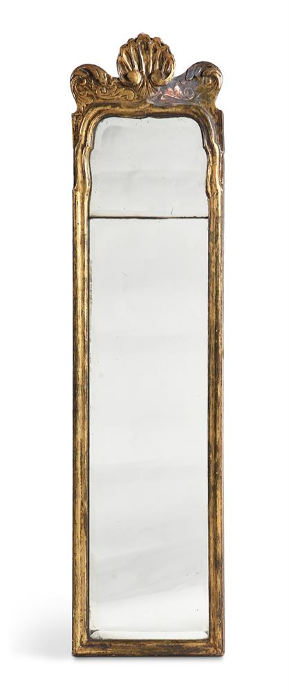 A GEORGE II CARVED GILTWOOD MIRROR, IN THE MANNER OF JOHN BELCHIER, CIRCA 1730