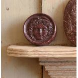 A CARVED RED PORPHRITIC STONE CAMEO OF THE MEDUSA RONDANINI, IN THE ITALIAN GRAND TOUR MANNER