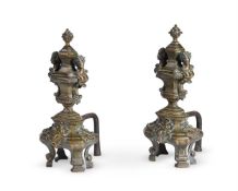 A PAIR OF FRENCH BRONZE ANDIRONS POSSIBLY REGENCE EARLY 18TH CENTURY