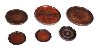 SIX MAHOGANY COASTERS AND STANDS, 18TH CENTURY AND LATER