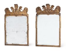 A PAIR OF GEORGE I GILTWOOD AND GESSO WALL MIRRORSIN THE MANNER OF MOORE & GUMLEY