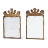 A PAIR OF GEORGE I GILTWOOD AND GESSO WALL MIRRORSIN THE MANNER OF MOORE & GUMLEY