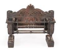 A REGENCY CAST IRON FIRE GRATE, IN THE MANNER OF GEORGE BULLOCK, CIRCA 1820