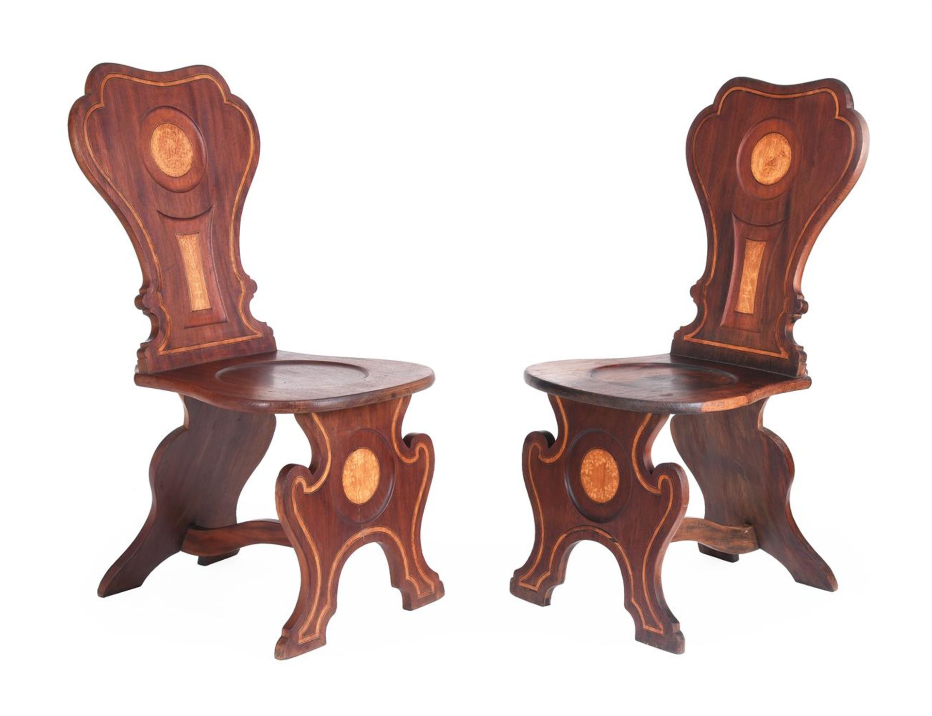 Y AN UNUSUAL PAIR OF GEORGE II MAHOGANY, SATINWOOD AND LINE INLAID HALL CHAIRS, CIRCA 1750