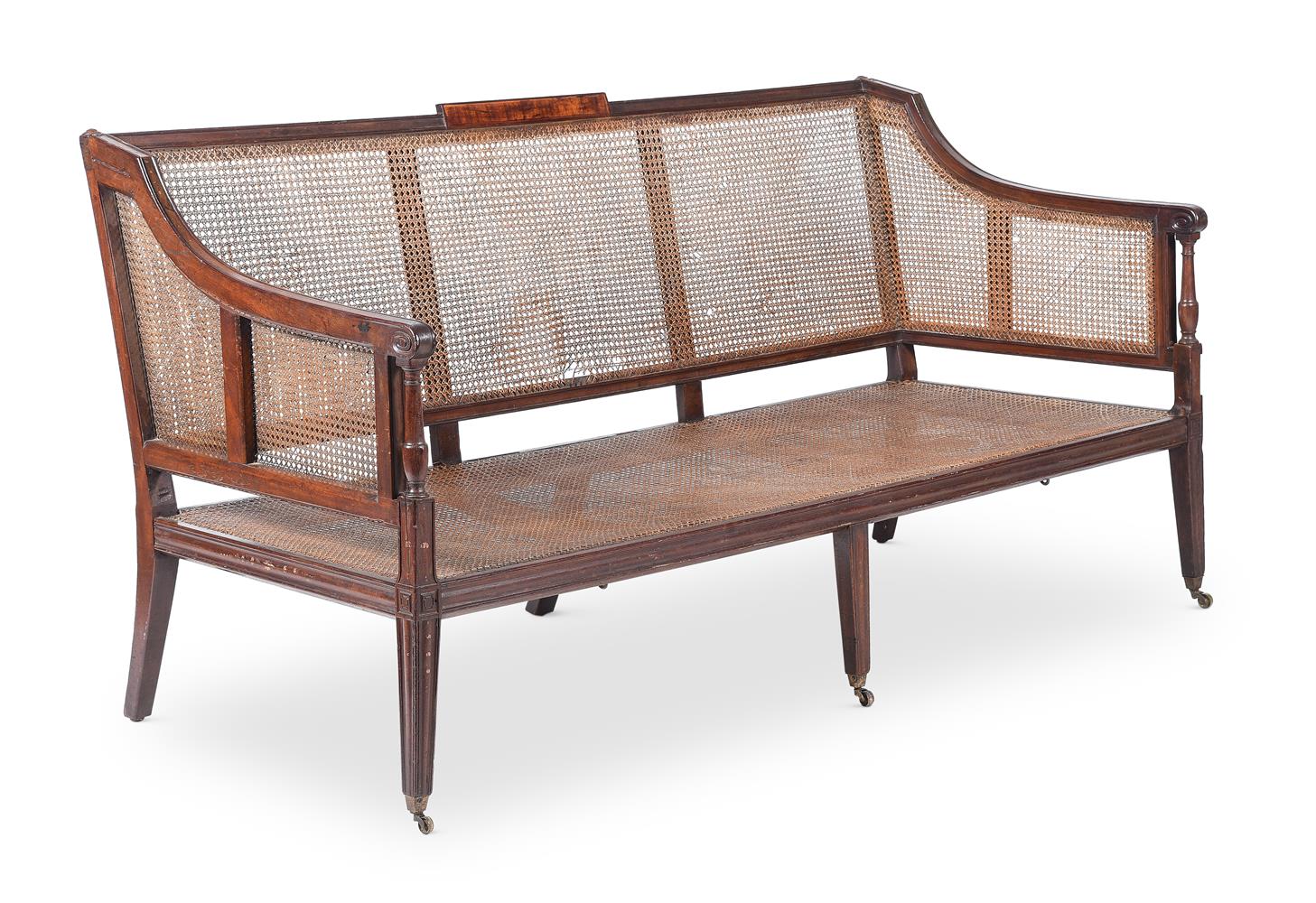 A REGENCY MAHOGANY BERGERE SETTEE, CIRCA 1820