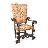 AN ITALIAN CARVED WALNUT AND CREWEL WORK UPHOLSTERED ARMCHAIR, LATE 17TH/18TH CENTURY