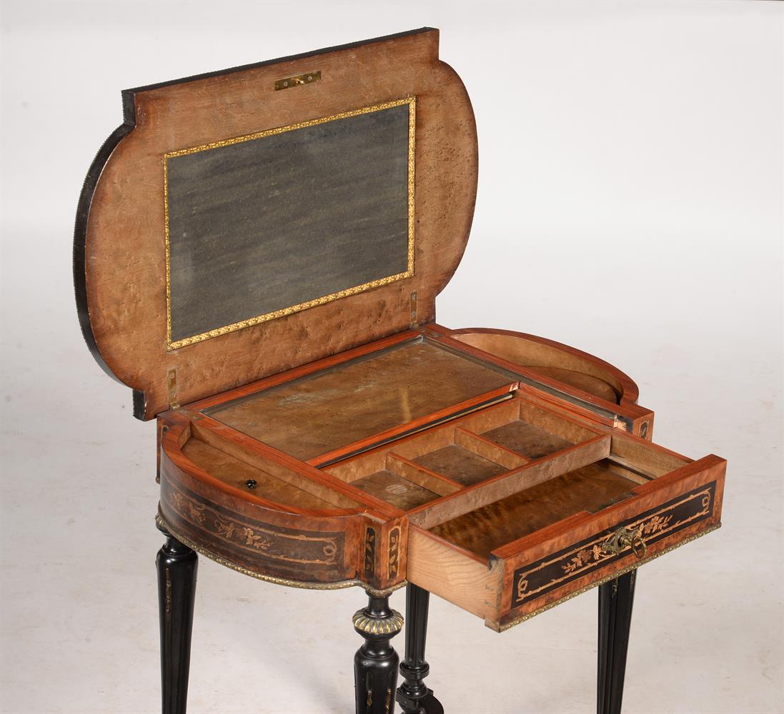 AN EBONISED AND GILT METAL OCCASIONAL TABLE IN NAPOLEON III STYLE - Image 3 of 3