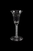 AN ENGRAVED MIXED TWIST WINE GLASS