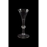 A BALUSTROID WINE GLASS