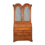 A WALNUT AND BURR WALNUT BUREAU CABINET