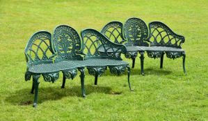 A PAIR OF GREEN PAINTED CAST ALUMINIUM GARDEN BENCHES, IN THE MANNER OF COALBROOKDALE, MODERN
