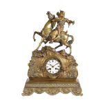 A FRENCH GILT METAL MANTEL CLOCK