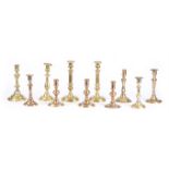 A GROUP OF VARIOUS BRASS CANDLESTICKS