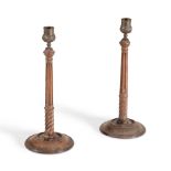 A PAIR OF GEORGE III MAHOGANY AND BRASS CANDLESTICKS, PROBABLY SCOTTISH