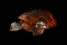LALIQUE, CRYSTAL LALIQUE, CAROLINE, AN AMBER AND CLEAR GLASS MODEL OF A TURTLE