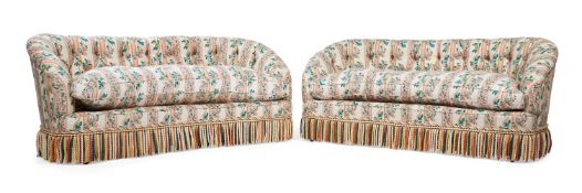 A PAIR OF KIDNEY SHAPED SOFAS IN VICTORIAN STYLE