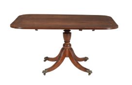 A REGENCY MAHOGANY AND BRASS INLAID BREAKFAST TABLE