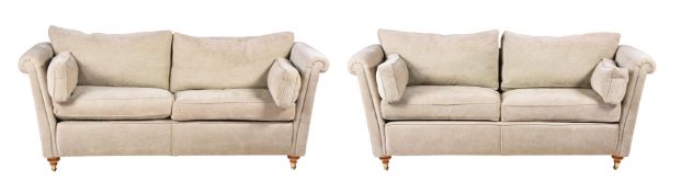 A PAIR OF UPHOLSTERED SOFAS