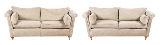 A PAIR OF UPHOLSTERED SOFAS