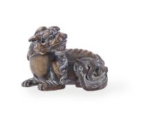A CHINESE BRONZE PAPER WEIGHT OF QILIN