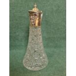 A silver Bacchus claret jug with hobnail cut glass vessel, standing 30cm tall by Parkin
