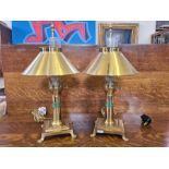 A pair of modern brass Paris-Istanbul Orient Express table lamps.