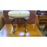 Mid Victorian tall carved cabriole legged foot stool with ball and claw feet with oval woolwork