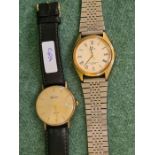 9ct gold quartz Geneve gents wristwatch and a Lorus gents wristwatch.