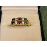 Heavy 9ct gold ring set with 2 emeralds, 4 diamonds, 2 rubies and 2 sapphires, size M.