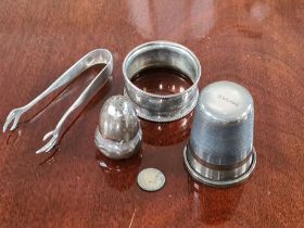Small items of silver, oversized thimble, sugar tongs, napkin ring and pepper pot, 60g.