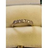 18ct white gold 5 diamond half eternity ring.