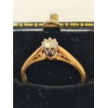 18ct yellow gold single stone diamond ring in shouldered claw setting.