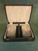 Pair of Charles Green engine turned brushes in fitted case, assay Birmingham 1965.